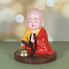Tượng Phật Chú Tiểu Gõ Mõ Gật Đầu Dùng Năng Lượng Ánh Sáng